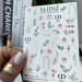 Фото 1 - Слайдеры для ногтей SLIDIZ 207 на водной основе фольгированное серебро, цветы розы, бренды